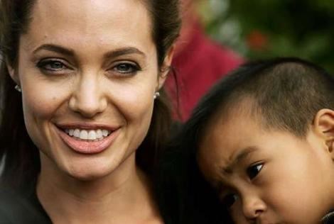 Angelina with adopted son Maddox 