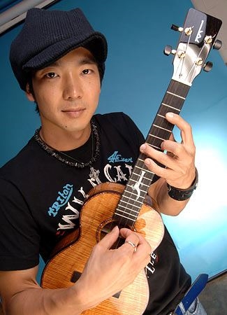 <a href=http://www.npr.org/templates/story/story.php?storyId=6155338>Jake Shimabukuro</a>