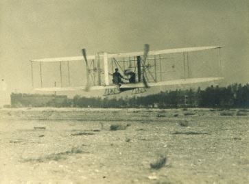 The brothers flying one of their planes  (google)