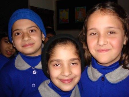 In the middle Manahil along with her friends (in the class)