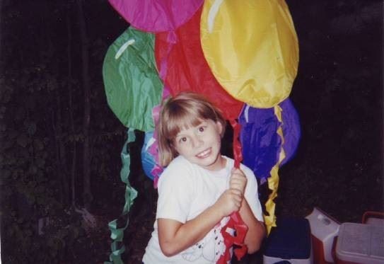 My sister in the summertime as a kid (Personal photo)