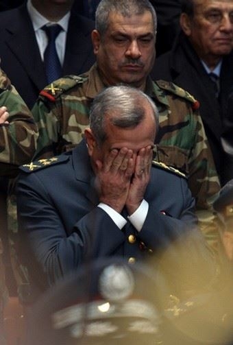 Michel Sleiman attends the funeral of slain Brigadier General Francois Hajj (http://cache.daylife.com/imageserve/00Zj7CG8oHfcE/340x.jpg)