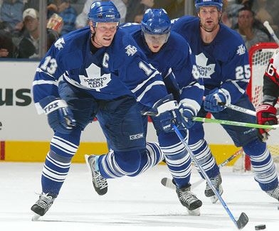 A hockey player also a Captain. (http://www.cbc.ca/sports/indepth/gfx/nhlpreview-sundin.jpg)