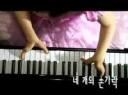 Hee Ah Lee with her 4 fingers playing piano