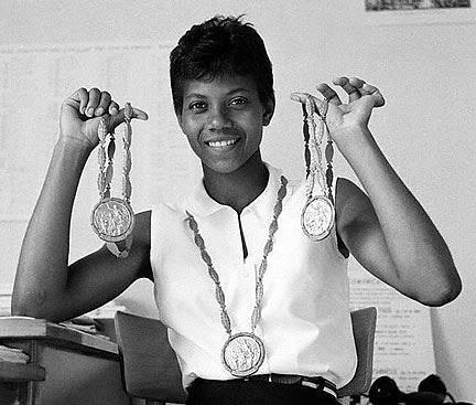 Wilma holding her medals (http://kclibrary.lonestar.edu/Wilma_Rudolph.jpg)