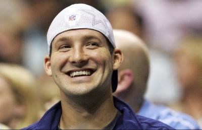 Tony Romo enjoying a good laugh (http://www.tonyromoonline.org/tony-romo-pictures.php)