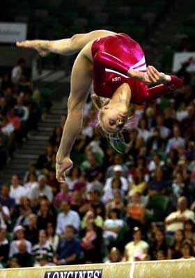 Nastia on beam (www.google.com)