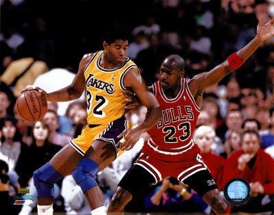 Michael Jordan is trying to block the player. (http://artfiles.art.com/images/-/Magic-Johnson-Michael-Jordan-Photofile-Photograph-C10125462.jpeg.The photographer is Jay Guerava.)