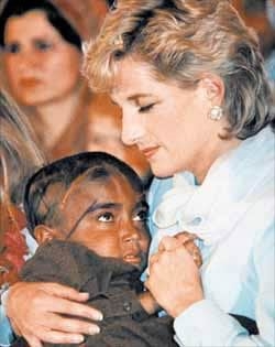 Princess Diana helping an injured child (http://www.biographyonline.net/people/diana/images/diana-charity.jpg)