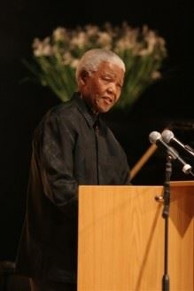 Nelson Mandela giving a speech (http://www.nelsonmandela.org/images/uploads/8)