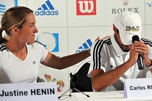 Justine Henin and Coach Carlos Rodriquez at a con