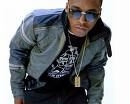 Lupe Fiasco (http://www.google.com/images?hl=en&source=imghp&q=lupe+fiasco&gbv=2&aq=0&aqi=g10&aql=&oq=lupe&gs_rfai=&safe=active)