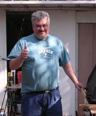Uncle Mike at our cabin, a place called home. (We took it.)