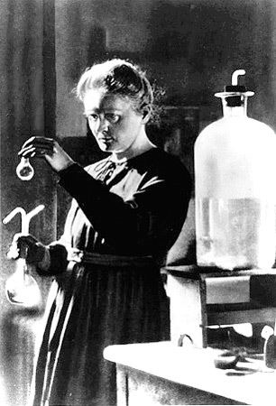 Marie Curie with flask. (http://reich-chemistry.wikispaces.com/file/view/Marie_curie_pic.jpg/98628437/Marie_curie_pic.jpg)