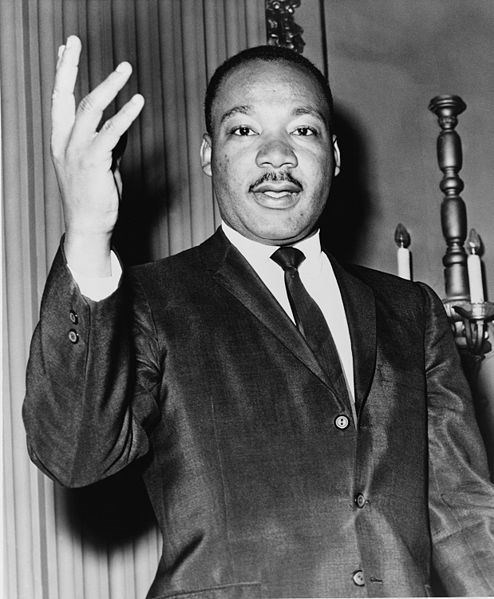 On this picture he is showing Integrity (http://www.lib.fit.edu/pubs/librarydisplays/BlackHistory/494px-Martin_Luther_King_Jr_NYWTS.jpg)