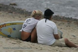 Bethany and her father praying. (http://www.lagunaphoto.com/surfing.html)