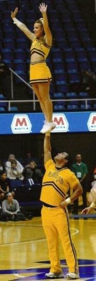 My brother stunting at a basketball game.