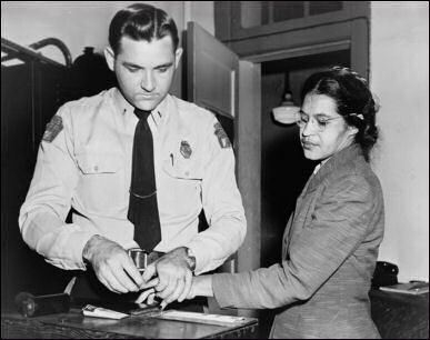 Parks at the police getting her fingerprint stamp (www.pacificviews.org/weblog/archives/001619.html)