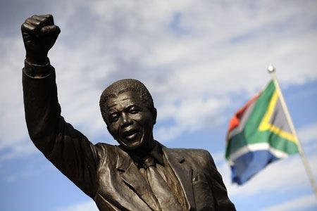 Nelson holding his fist up for power and freedom. (Google Images-Nelson Mandela)