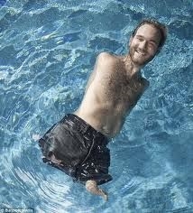 Nick swimming in a pool (connect.in.com)