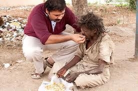 Narayanan helping someone.