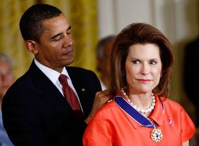 Nancy Brinker getting her award from President Ob (www.nakedthanks.com)