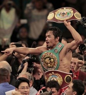 many with a few of his itle belts (http://www.commercialappeal.com/photos/2009/nov/15/139828/)
