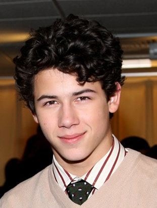 Nick Jonas posing for a picture. (http://www.drfunkenberry.com/2009/08/03/nick-jonas-continues-to-fight-diabetes/)