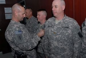 Kauzlarich awarding medals to soldiers (http://a6.sphotos.ak.fbcdn.net/hphotos-ak-snc3/24501_371323774992_110065279992_4752124_225078_n.jpg)