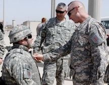 Kauzlarich meeting a soldier in the 2-16 (http://d3.static.dvidshub.net/media/thumbs/450x352/photos/1006/291357_q75.jpg)
