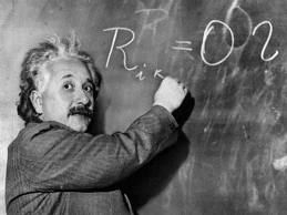 Einstein working on one of his many theorems. 