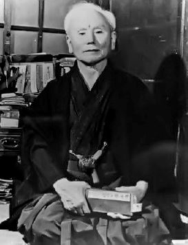 An iconic picture of sensei Gichin Funakoshi (http://tinyurl.com/3krbd32)