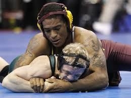 Anthony wrestling Ben Kjar of Utah Vally (http://usatoday30.usatoday.com/sports/college/2011 ())