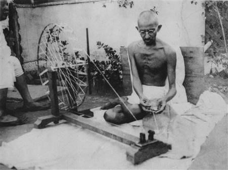 Gandhi using the spin wheel for one hour a day. (http://en.wikipedia.org/wiki/Spinning_wheel (http://en.wikipedia.org/wiki/Spinning_wheel))