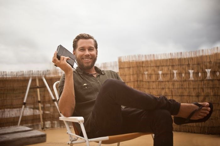 Kai Neville relaxing (encyclopediaofsurfing.com (Nate Lawrence))