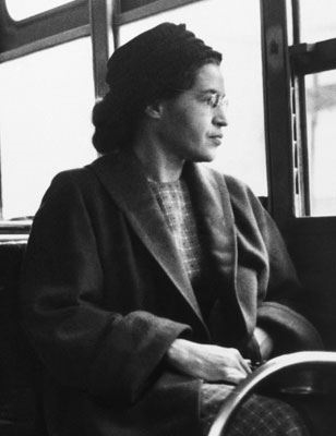 Rosa Parks staring out of a bus window (deepsouthmag.com ())