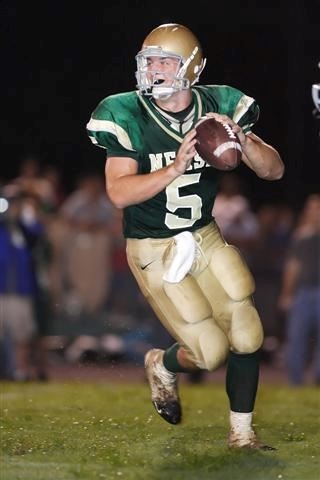 Tim Tebow playing football for Nease High School (http://www.maxpreps.com/news/AmVWLhtREd-UswAcxJTdp (Unknown))
