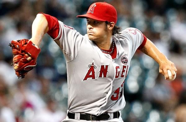 CJ Wilson doing what he loves (http://articles.latimes.com/2013/jun/30/sports/la- ())