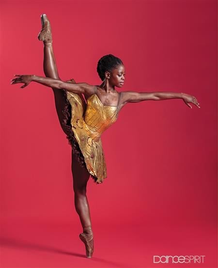 Michaela is posing on pointe for a photoshoot (http://www.dancespirit.com/uncategorized/the-next- ((photo by Michel Schnater)))