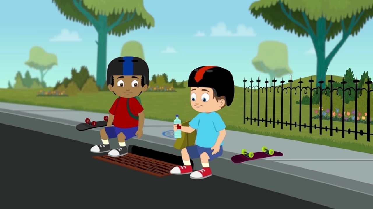The two main characters, James and Isaac, sit on the sidewalk next to each other.