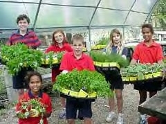 ACES students with their harvest