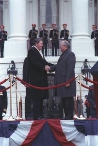 <p align=center>President Reagan and Soviet General Secretary Gorbachev shaking hands at the arrival ceremony on the White House south lawn  (Courtesy Ronald Reagan Library)</p>