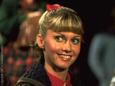 <a href=http://images.allmoviephoto.com/1978_Grease/1978_grease_010.jpg>This is Olivia's character in Grease!</a>