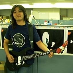 Jun Senoue-Sama with a wicked Sonic Guitar! (His website, with his band, Crush 40.)