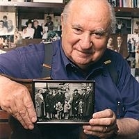 Shep Zitler showing a picture of his family