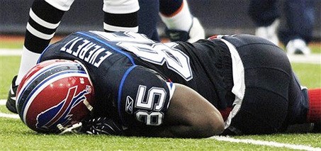 Everett lies motionless on the feild. (AP Photo)