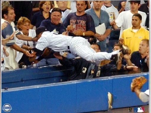 Jeter dives into stands. (http://thehottestishh.wordpress.com/2009/06/15/yankees-win-series-2-1/derek-jeter-dive-into-stands/)