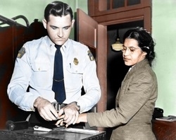 Rosa is being booked into jail (http://www.rosaparksfacts.com/rosa-parks-pictures-photos.php?type=civil-rights)