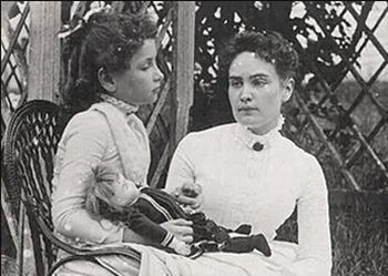   Anne Sullivan teaching Keller about a D-O-L-L. (ipentimento.com)