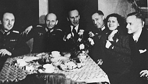 Schindler at a party with Nazi officials (Historyplace.com))